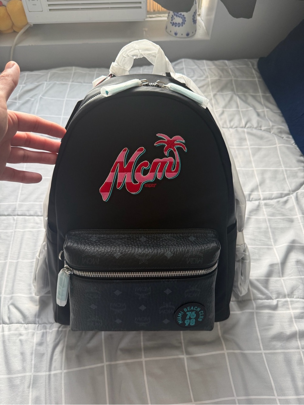 MCM Black Backpack with Pink and Teal Logo